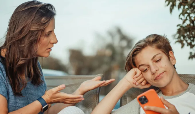 mother and teen having serious conversation