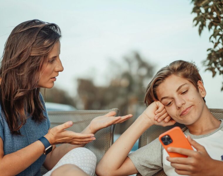 mother and teen having serious conversation