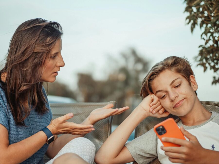 mother and teen having serious conversation