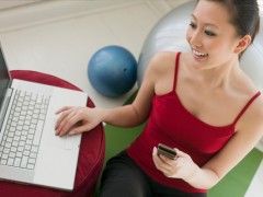 woman-exercising-near-computer